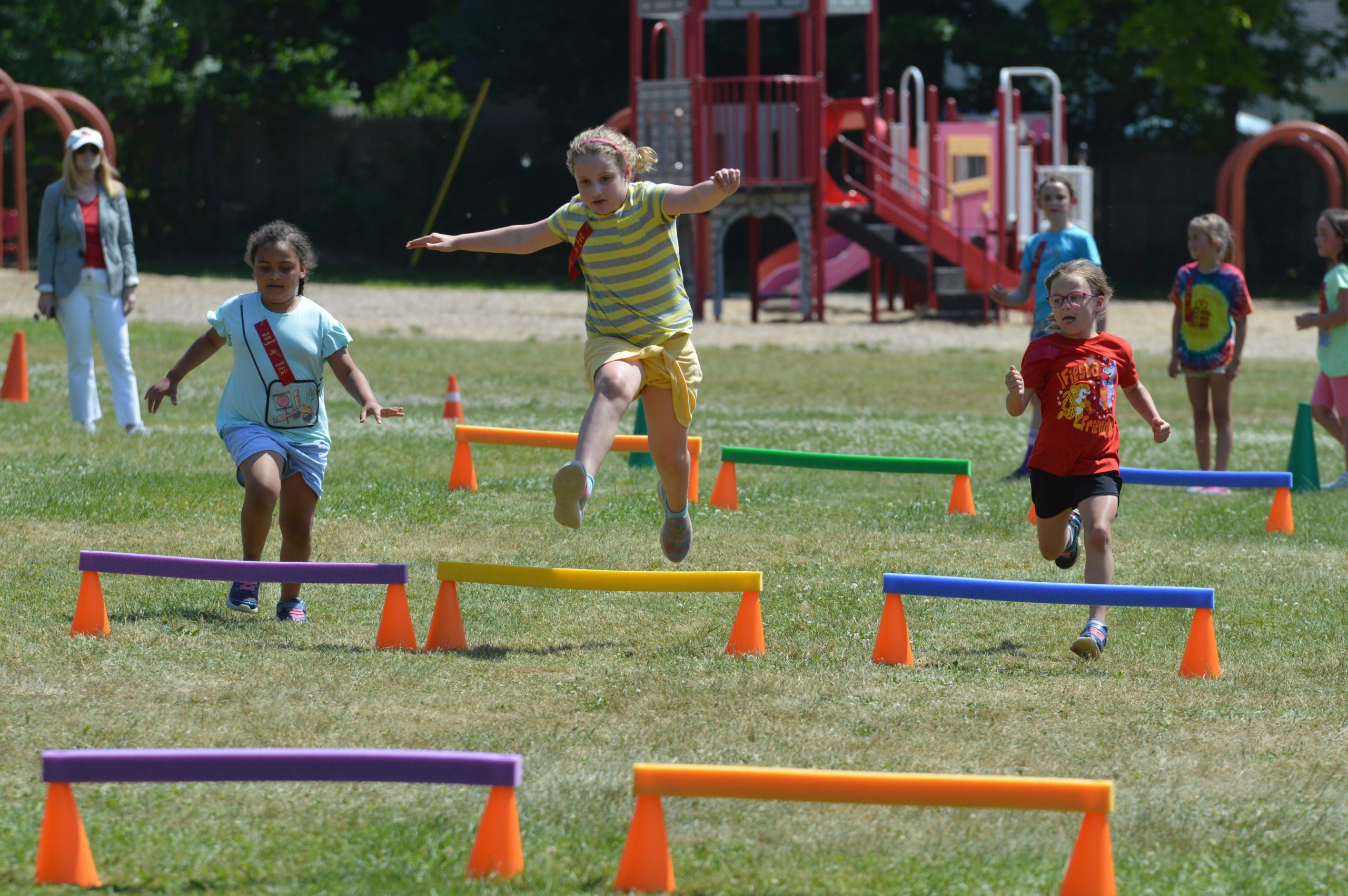 Students running at Red Mill Field Day