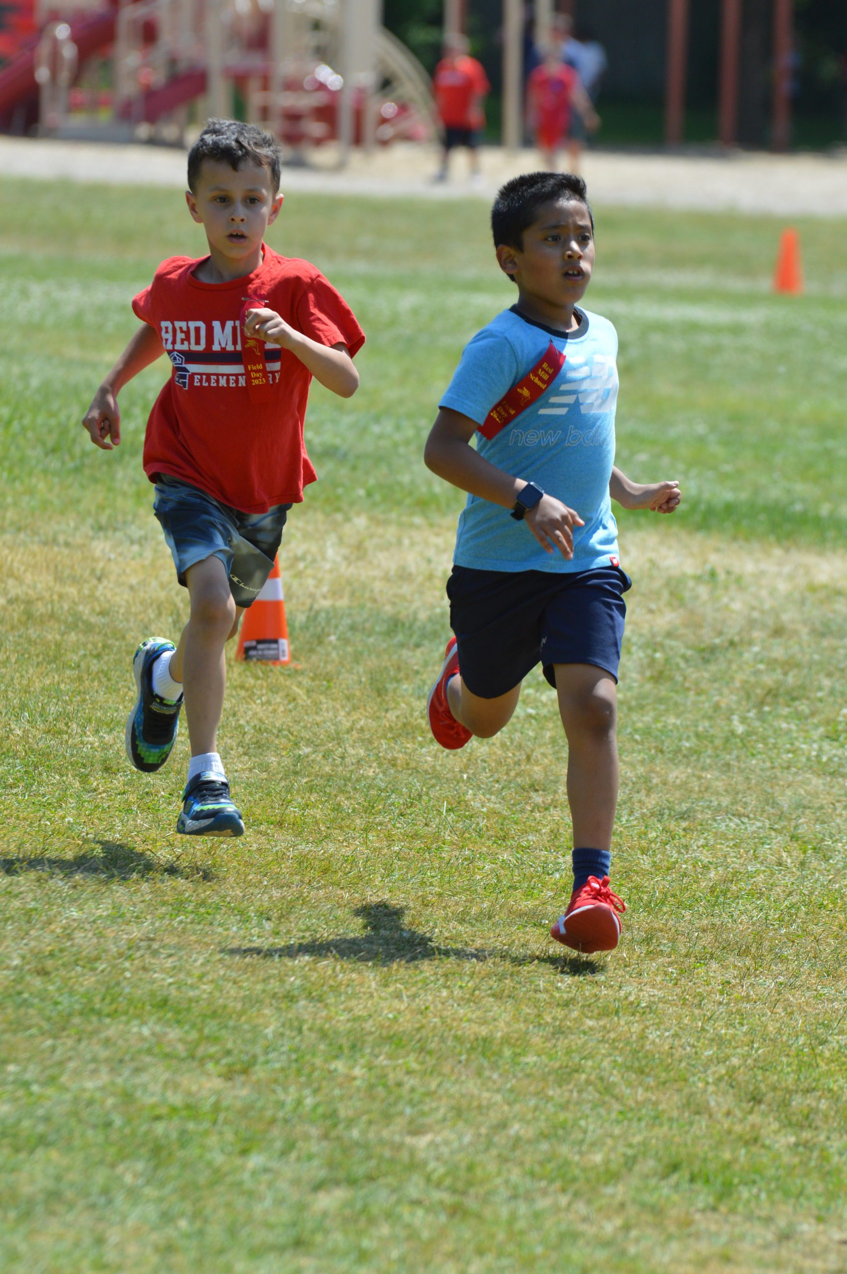 Students running at Red Mill Field Day