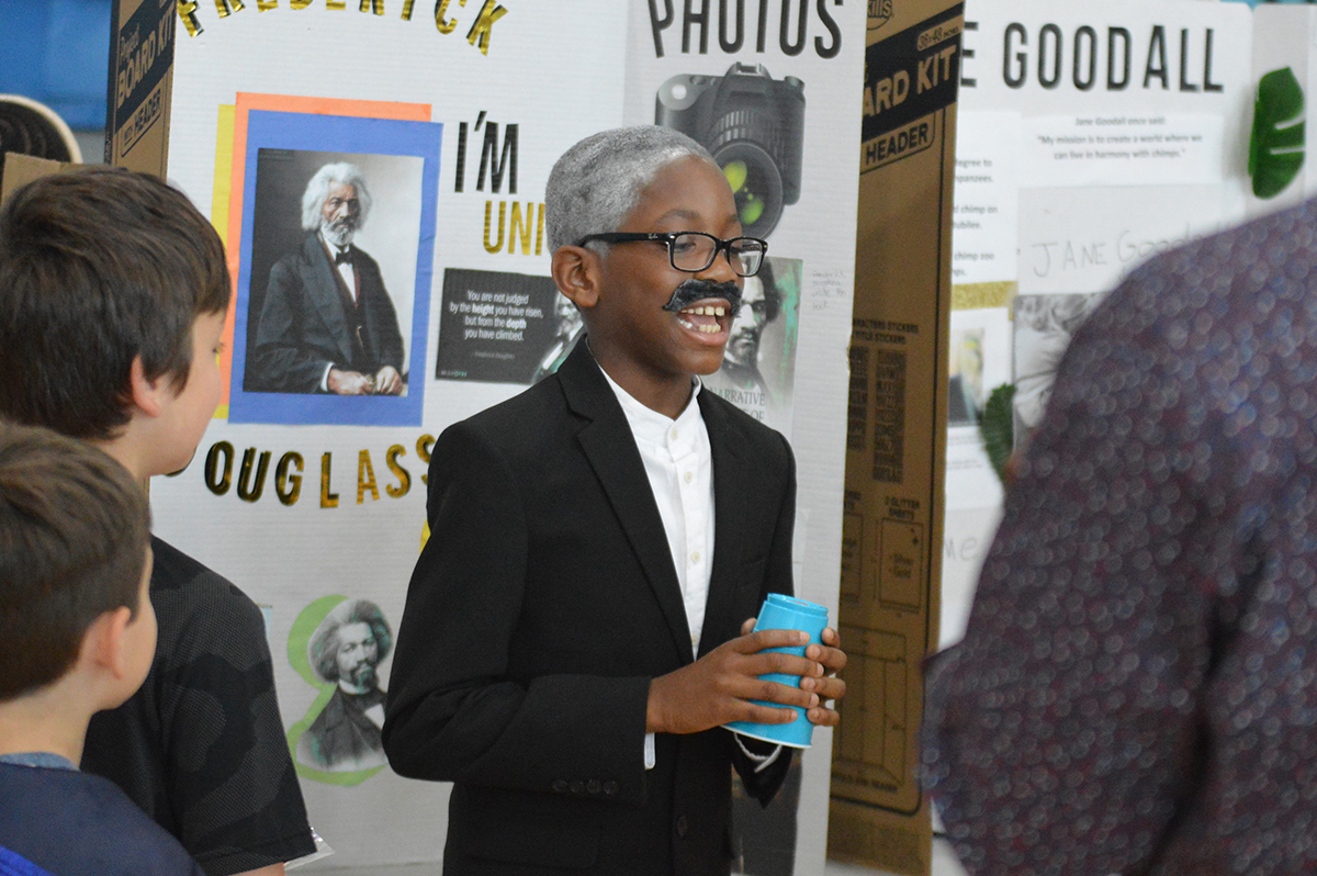 A Genet student portrays Frederick Douglas at the school's interactive wax museum.