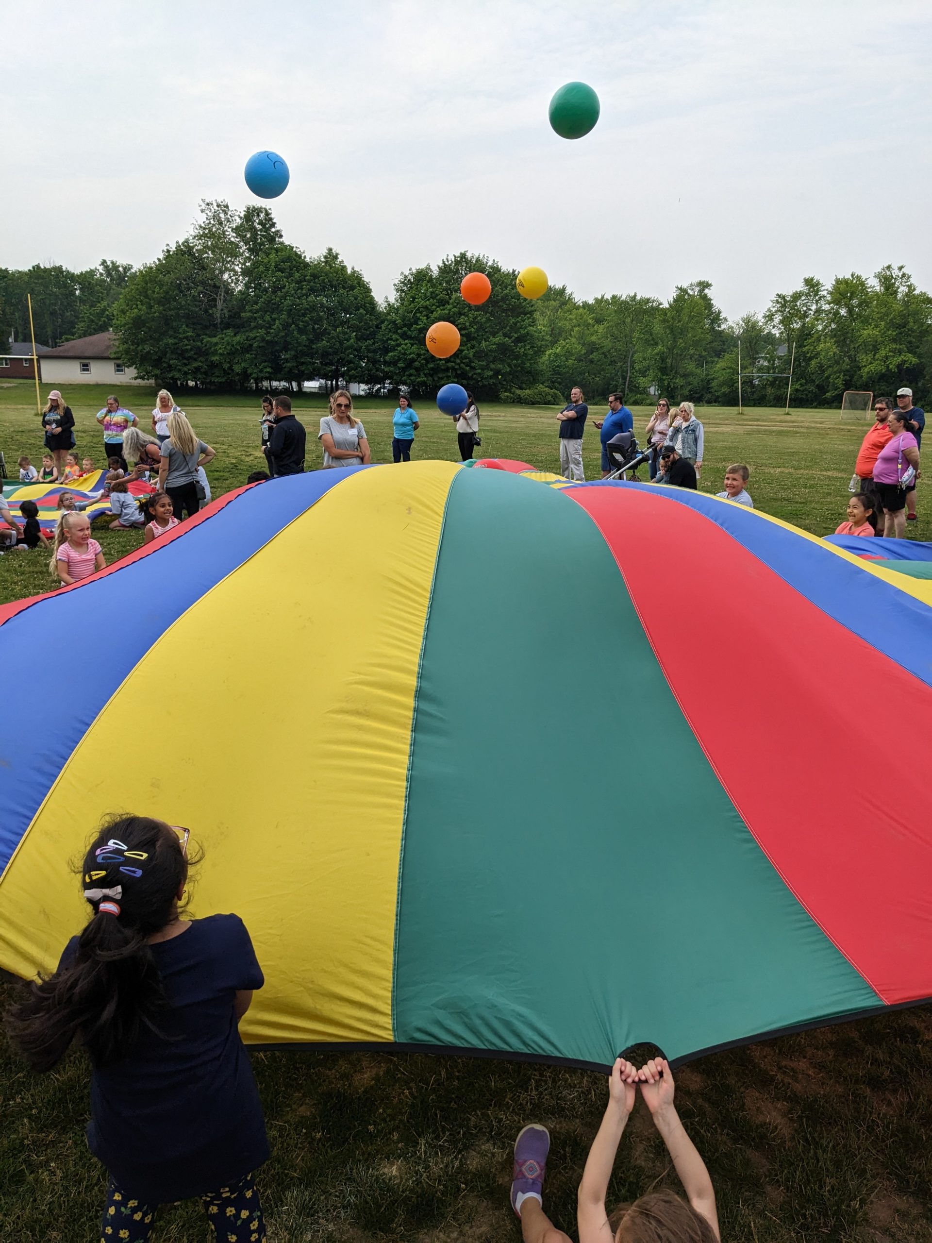 Parachute games at Genet Fun Day