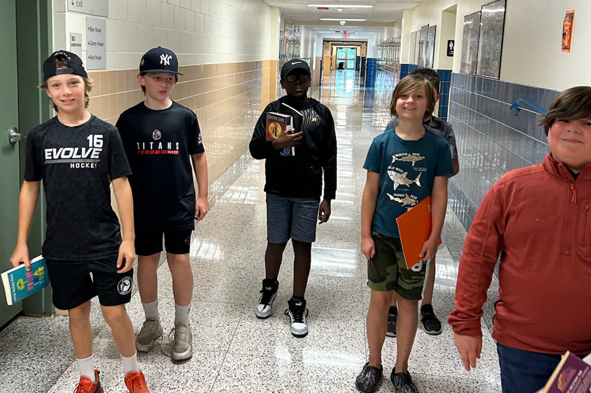 Students walking through hallway at Goff Middle School