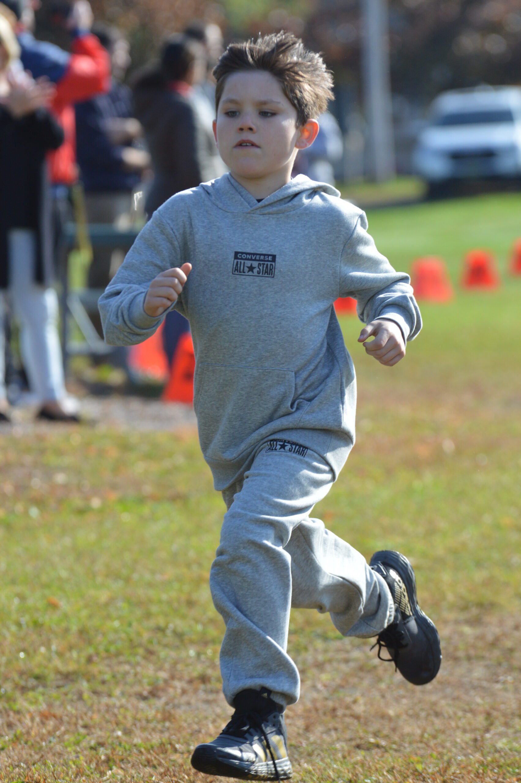 Students running in the 2023 Green Meadow Apple Race