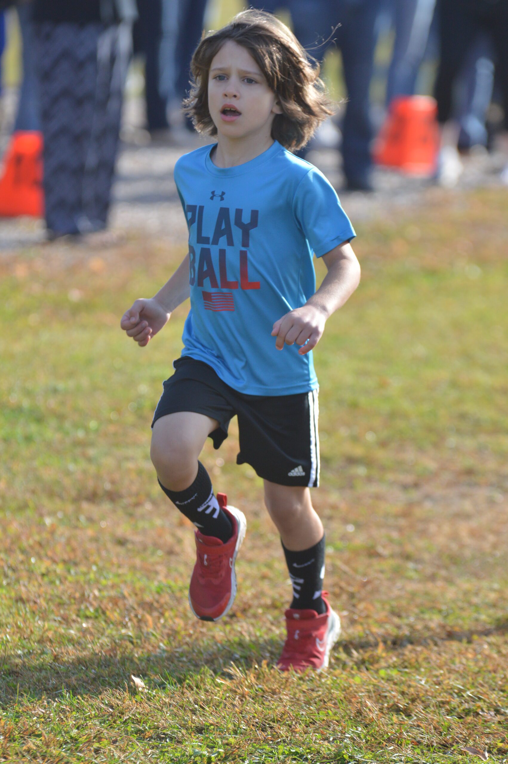 Students running in the 2023 Green Meadow Apple Race