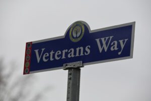 Green Meadow Veterans Way street sign