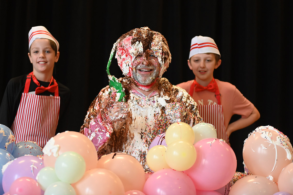 Genet Principal Wayne Grignon was turned into an ice cream sundae by students in celebration of meeting their fundraiser goal.