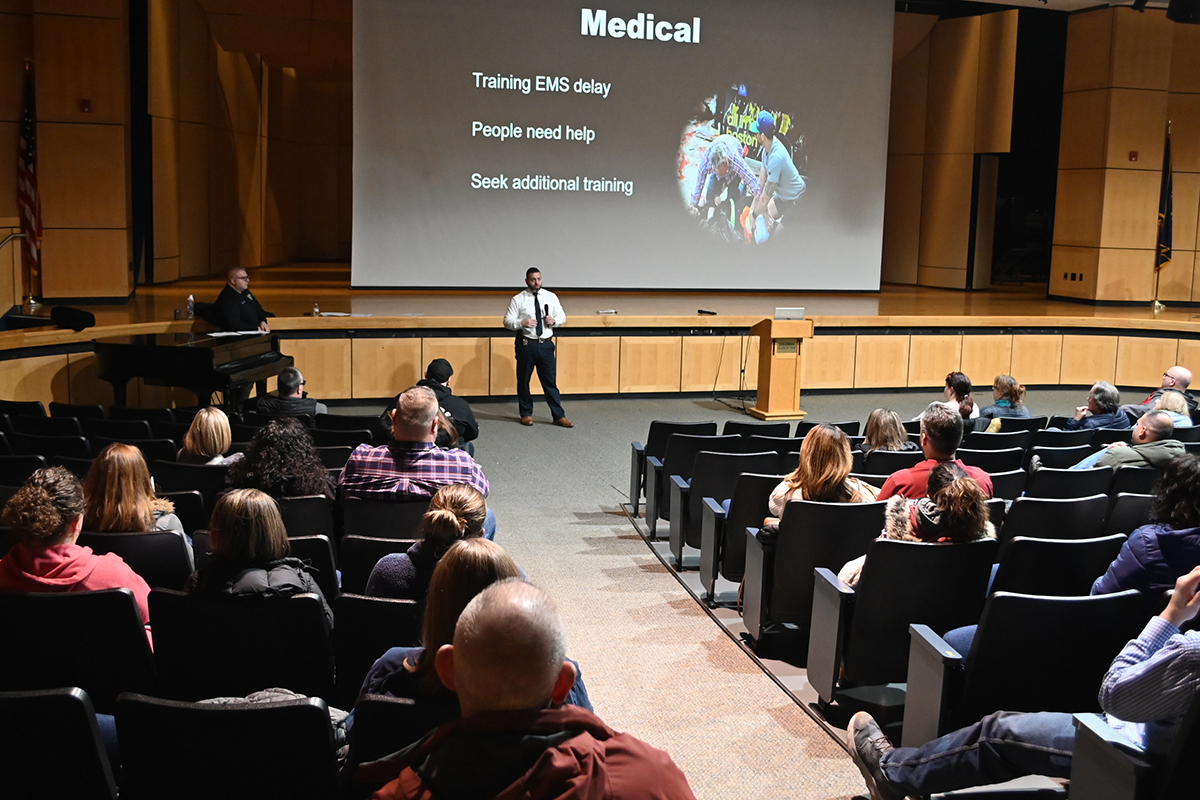 Detective Sergeant Mike Guadagnino leads a safety training for East Greenbush CSD parents and guardians on Thursday evening in the Columbia High School auditorium.