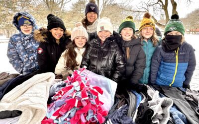 Bell Top K-Kids Distribute Winter Clothing to People in Need