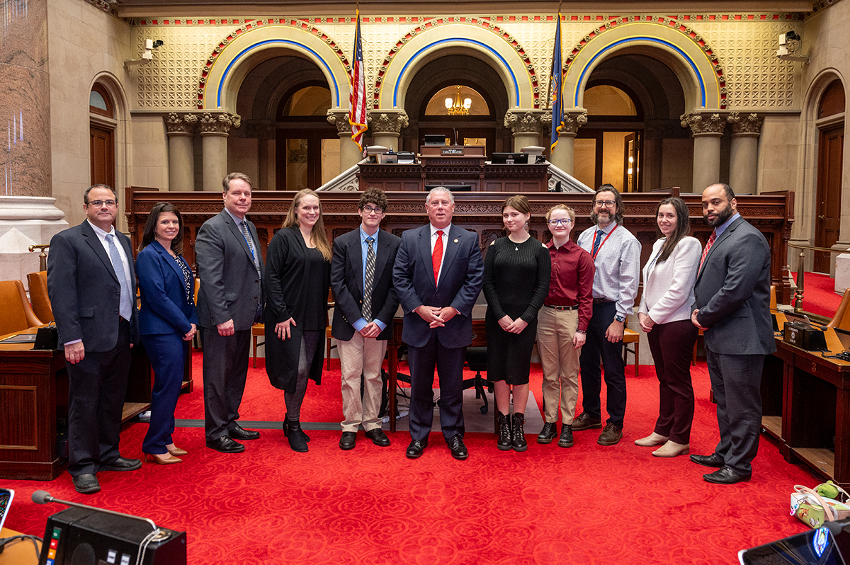 Members of the East Greenbush Central School District's Advocacy Committee meeting with Assemblyman John McDonald in the NYS Assembly chamber as part of Legislative Lobby Day on March 8.