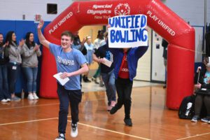 Students from the Columbia Unified Basketball and Bowling teams being introduced at a pep rally on Thursday in the school gym.