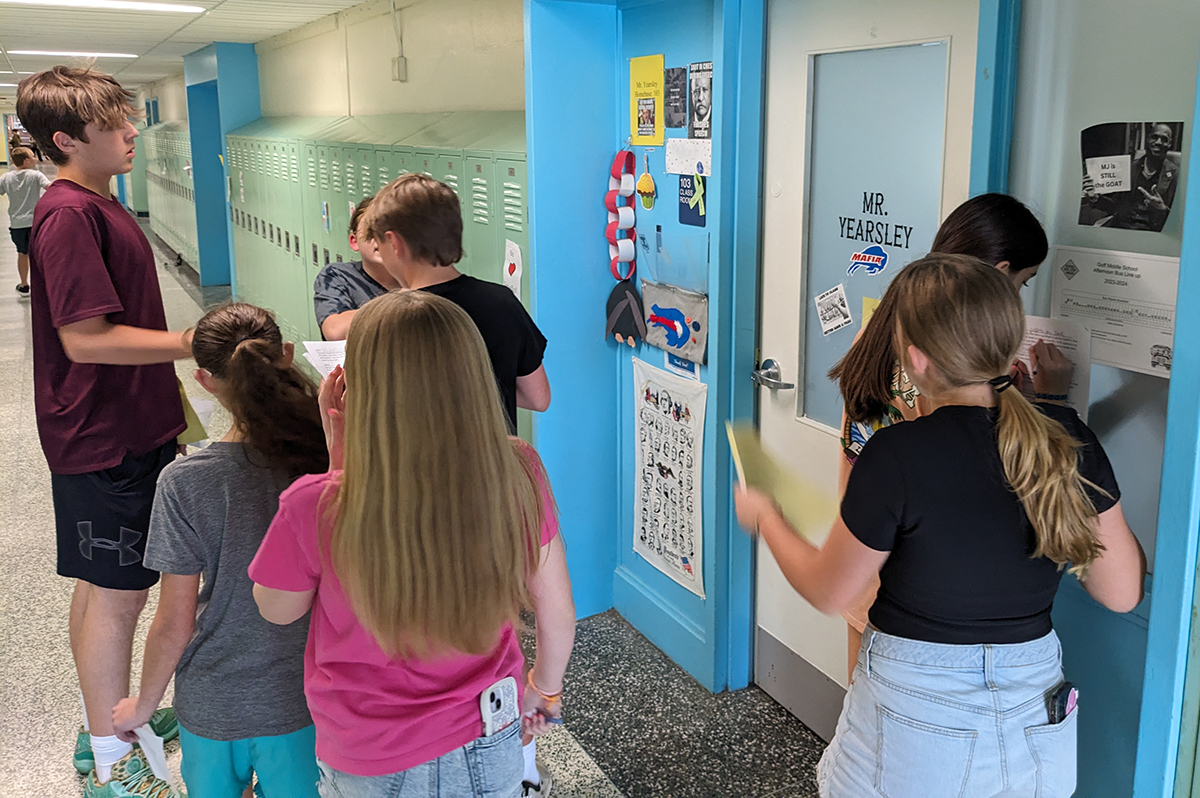 Students searching for clues in the Great Goff Scavenger Hunt