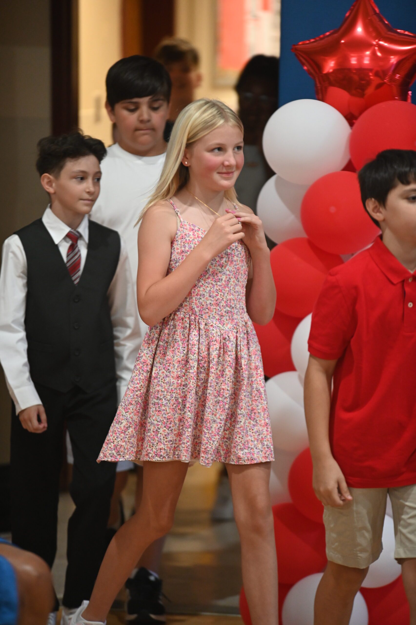 Student processional at the 2024 Red Mill 5th Grade Moving Up Ceremony