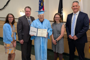 Abe Seeberger receives high school diploma