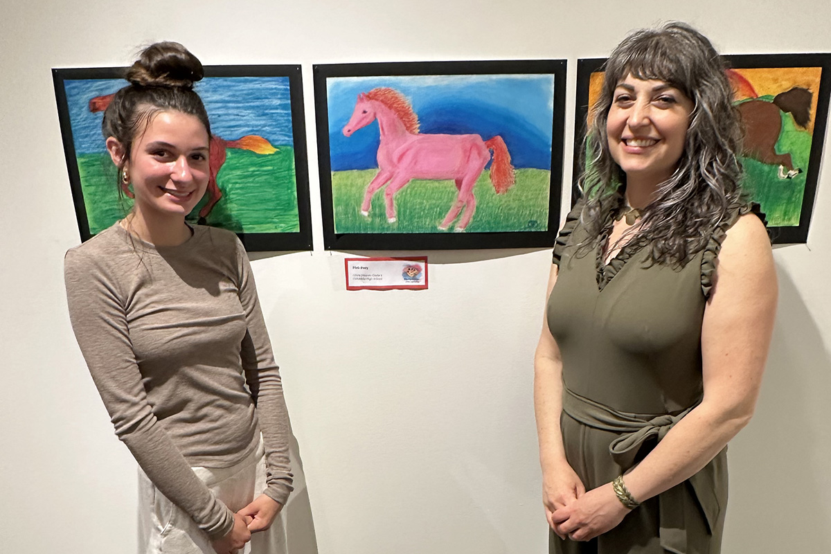 Olivia DiNovo with Columbia Art Teacher Andrea Neiman at the Win, Place, Show Art Exhibit