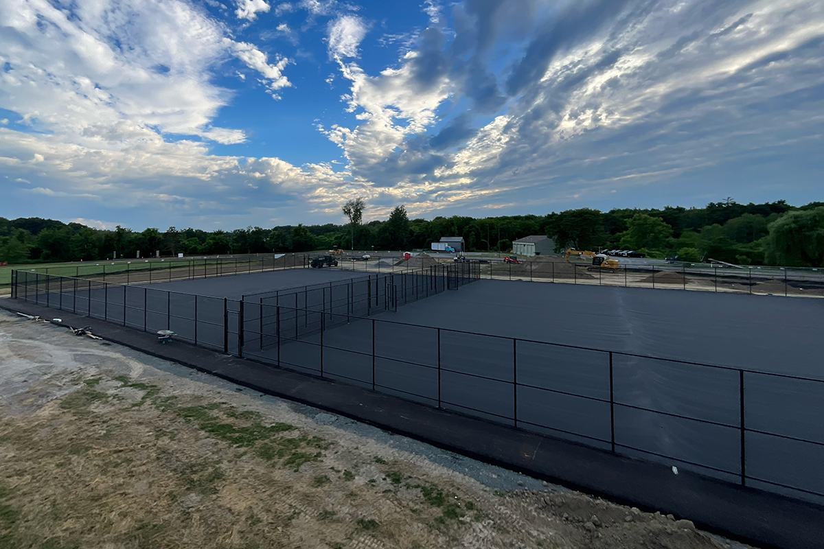 The new Columbia High School tennis courts after a first coat of sealer