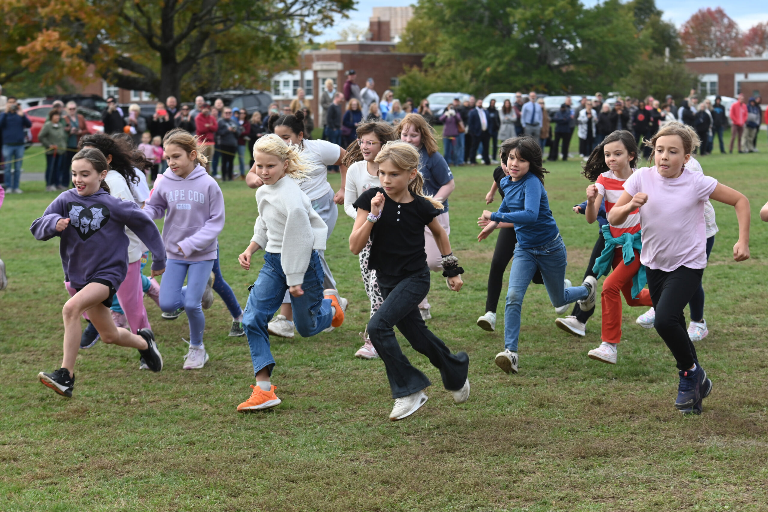 Students running at the 2025 Genet Fall Fun Run
