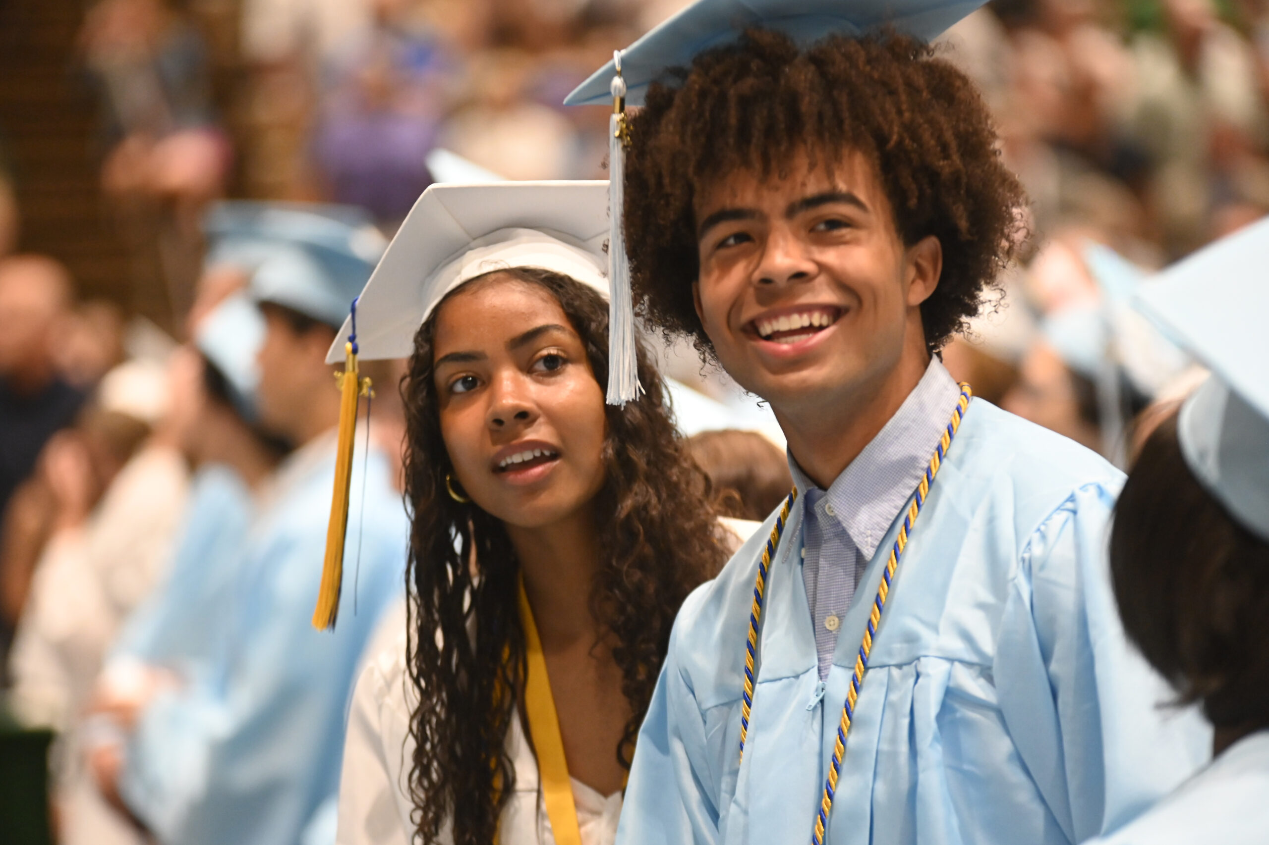 Students look for their families at the Columbia High School Class of 2025 Graduation