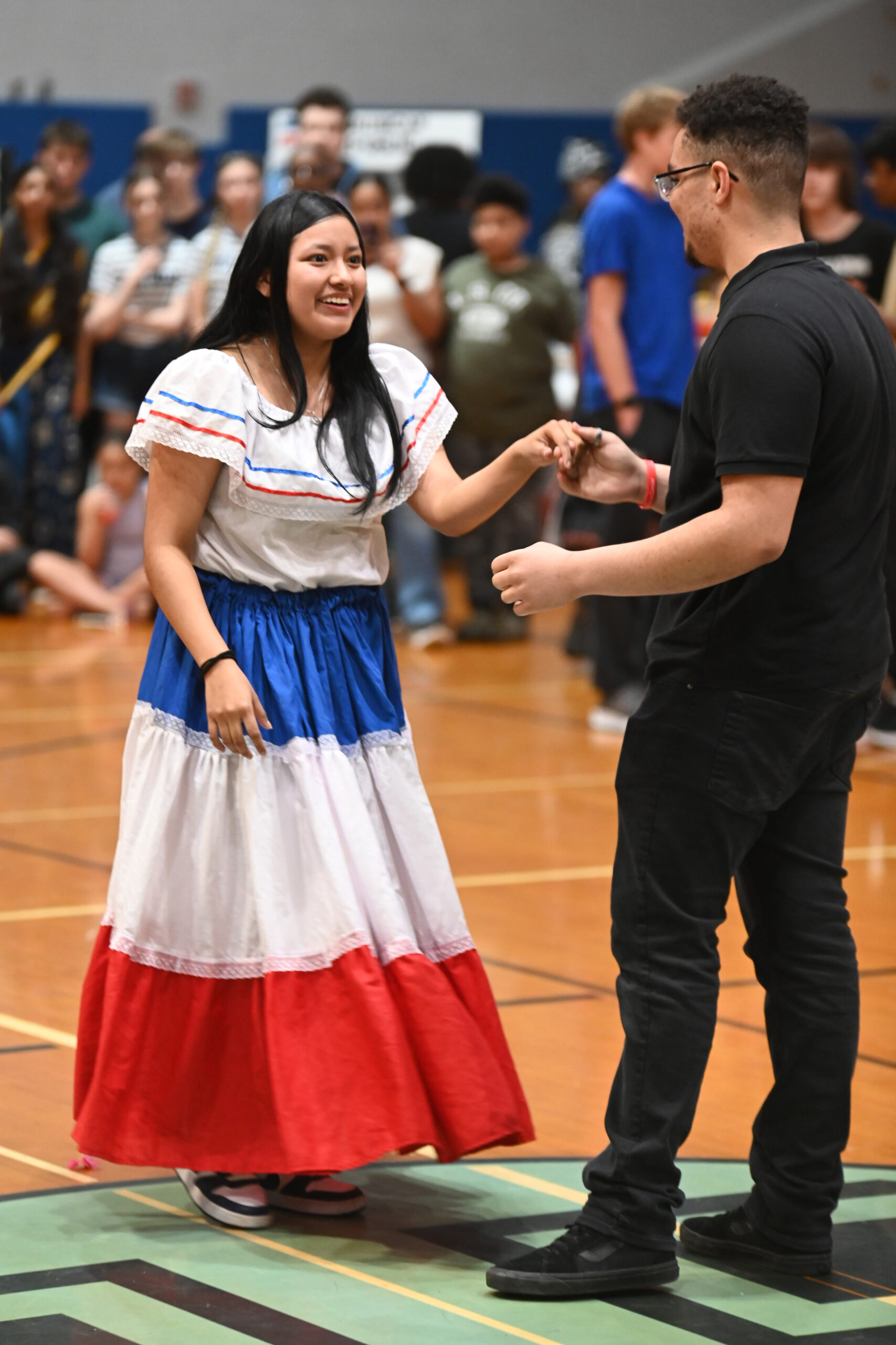 Students dancing at the 2026 Multicultural Fair at Columbia High School