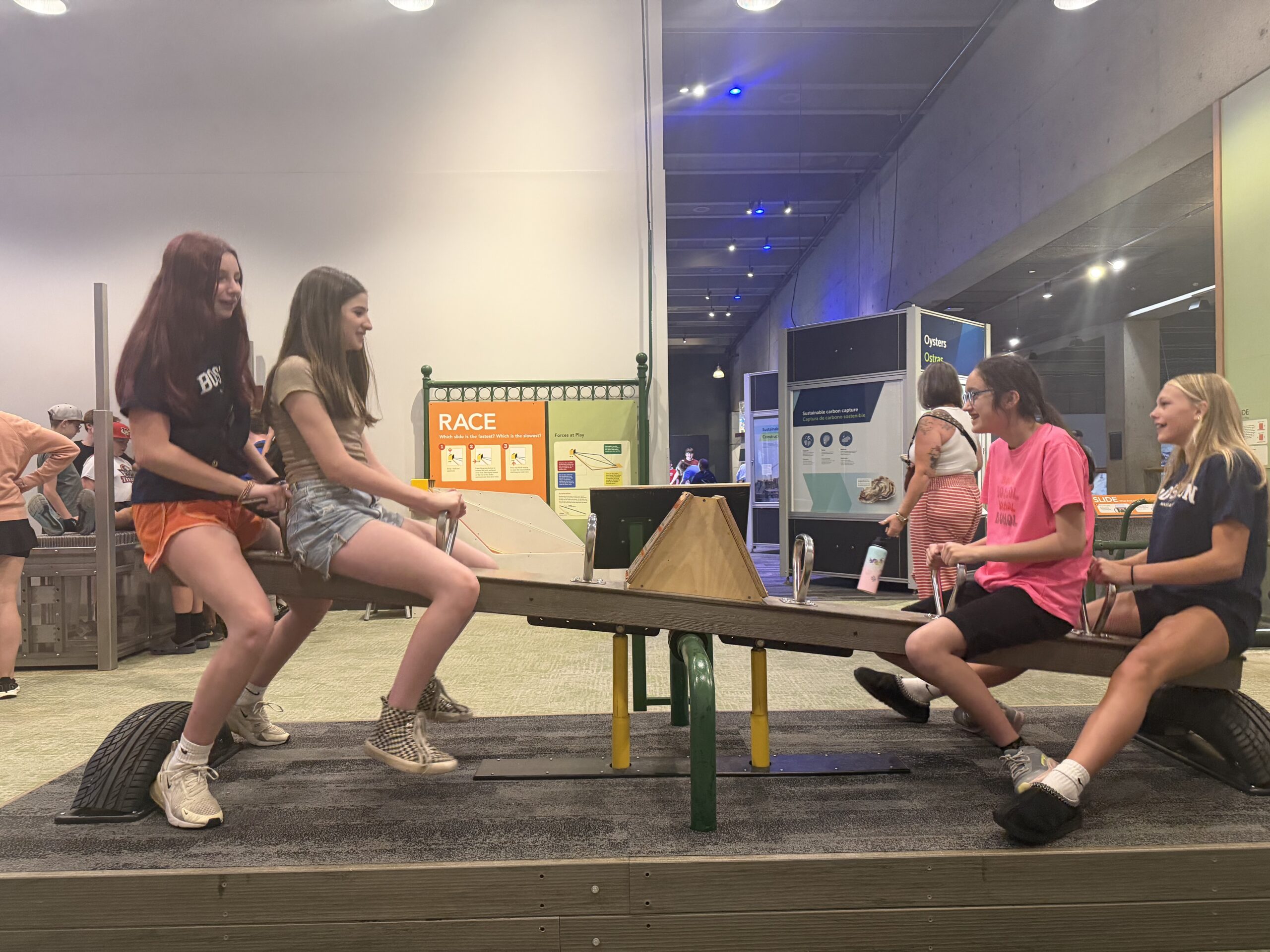 Students on seesaw