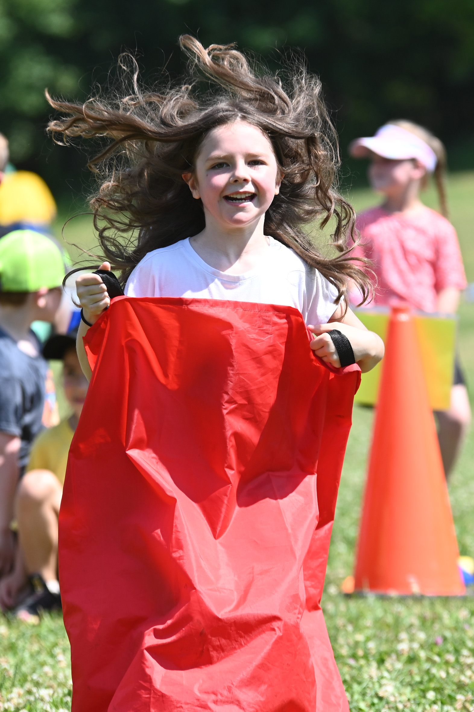 A student in potato sack race at DPS Field Day