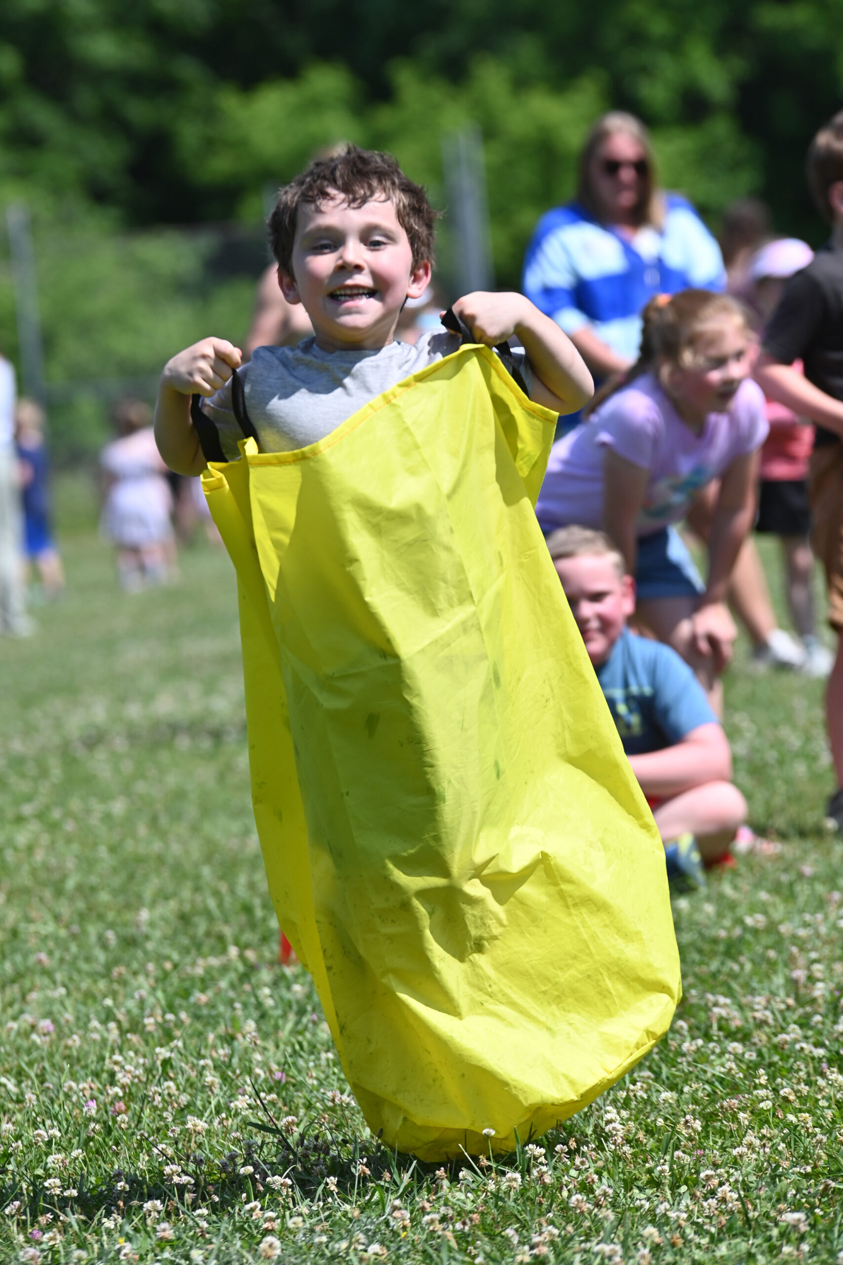 A student in potato sack race at DPS Field Day